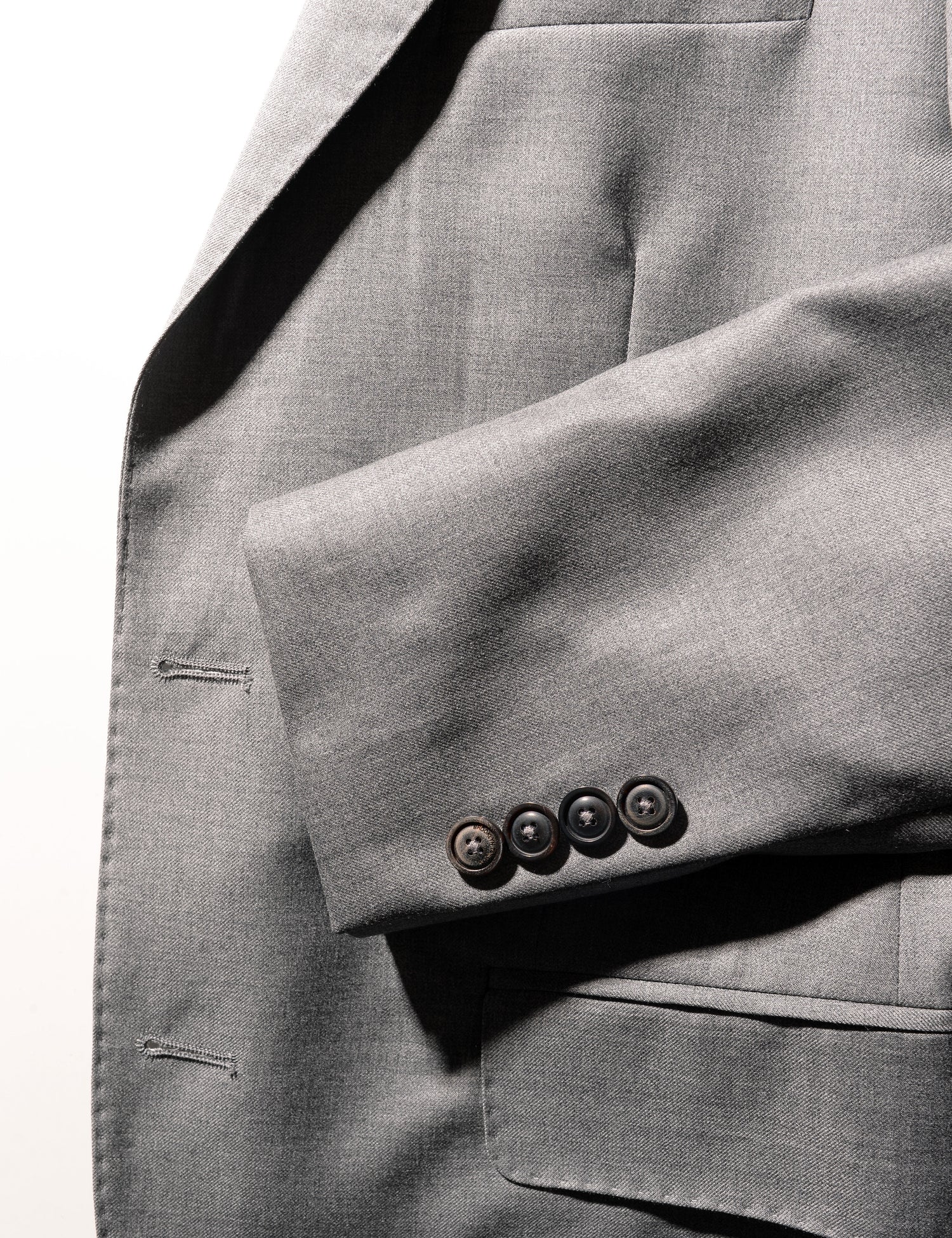 Detail shot of Brooklyn Tailors BKT50 Tailored Jacket in Super 110s Twill - Dove Gray showing lapel and cuff