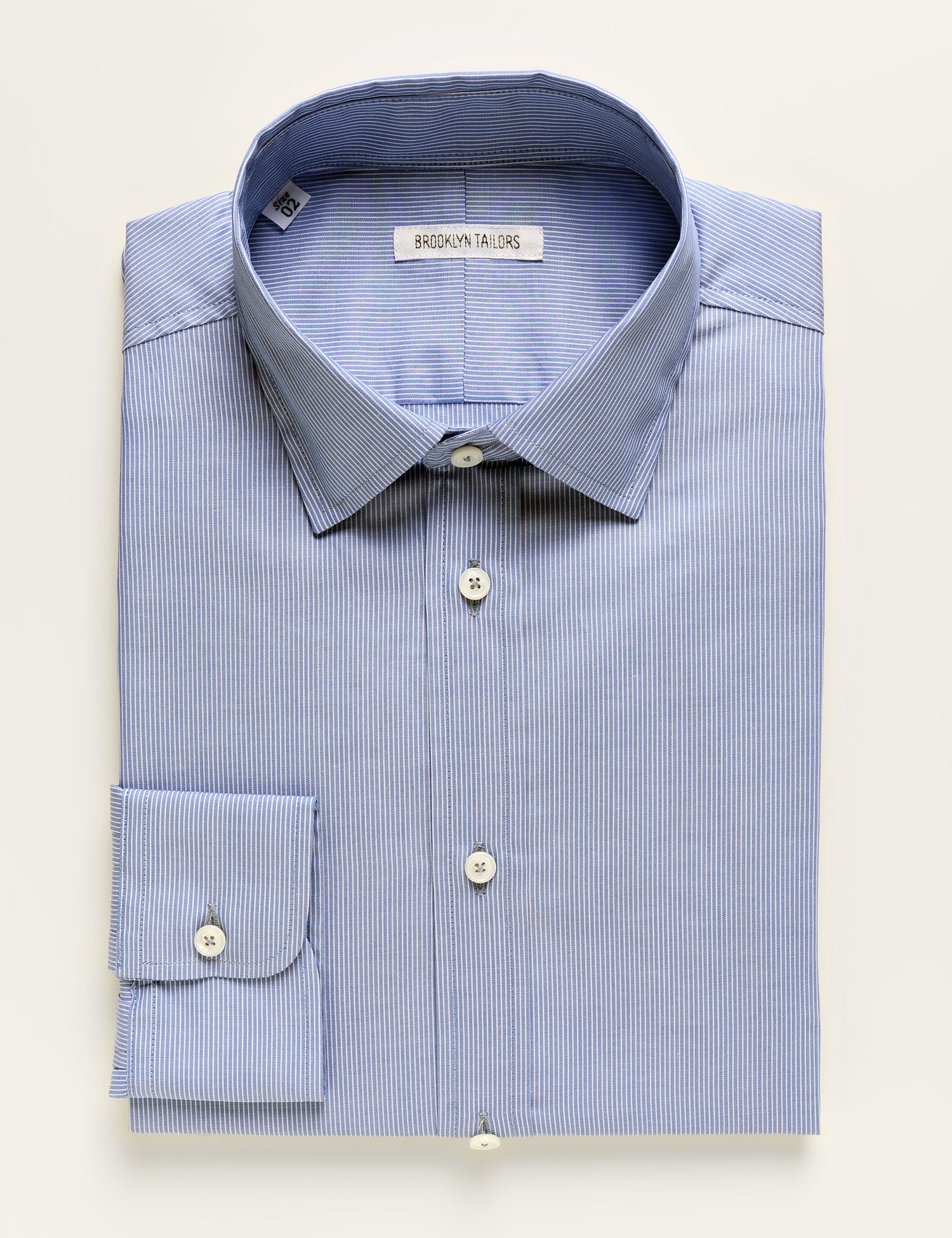 Brooklyn Tailors BKT20 Slim Dress Shirt in Professional Stripe - Imperial Blue folded flat shot
