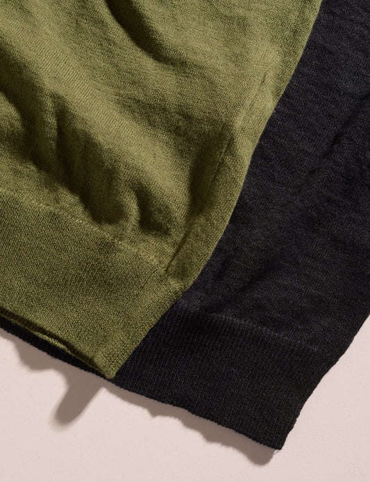 Close-up shot of two colors of Filippo de Laurentiis Linen/Cotton Crewneck Sweaters to show bottom banding and colors