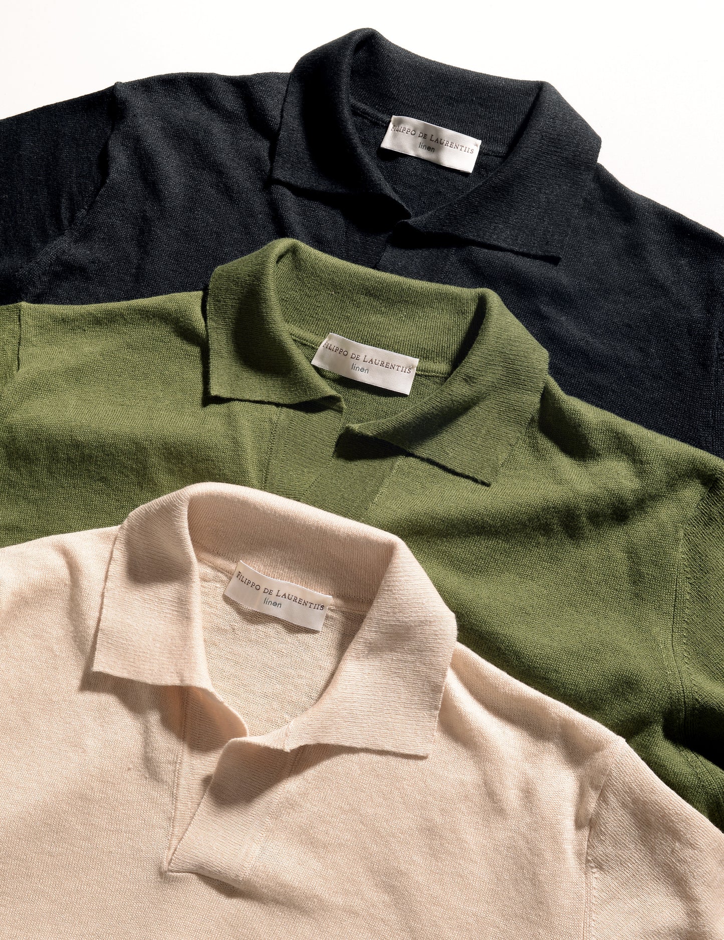 Close-up of three colors of linen/cotton skipper polos