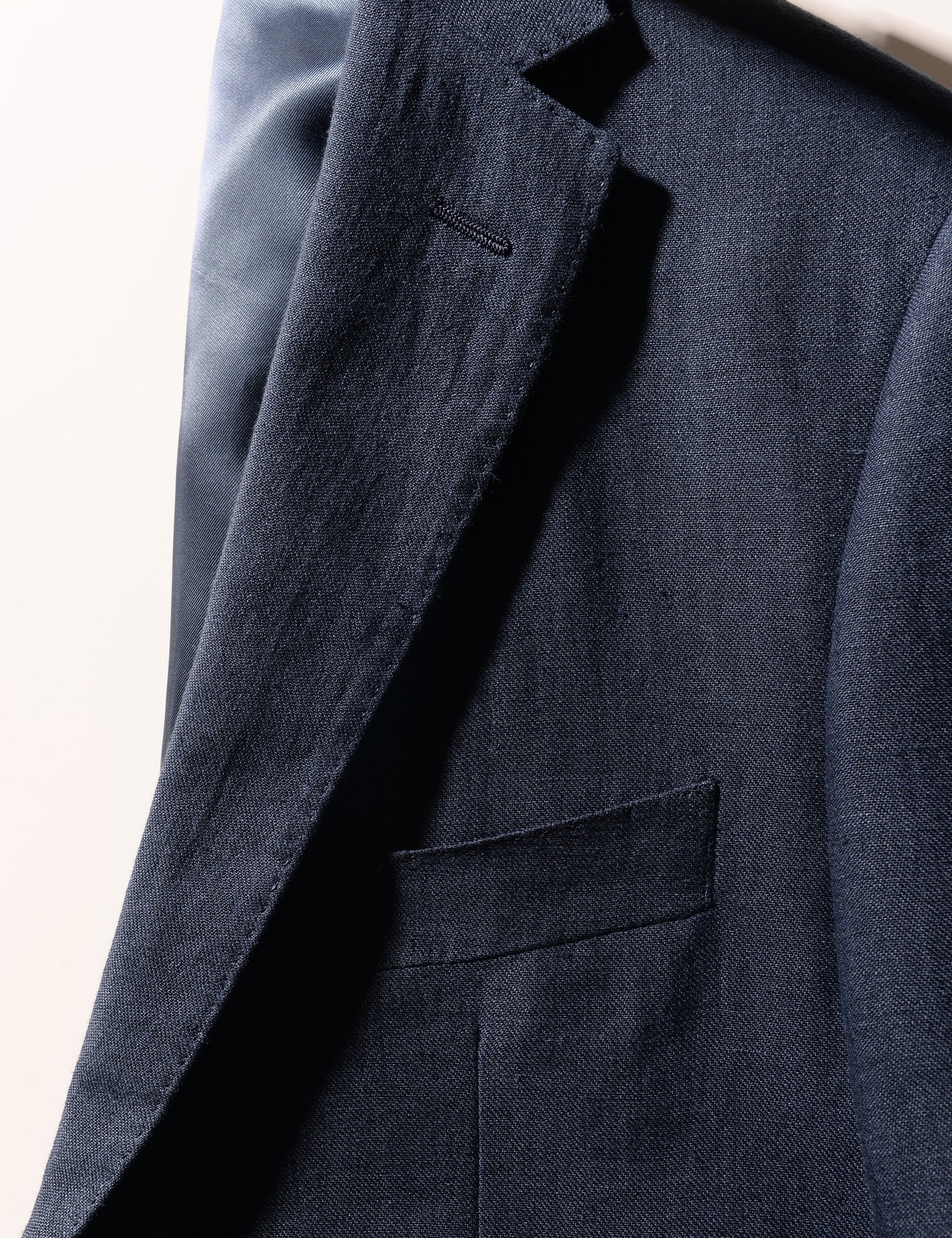 Detail shot of Brooklyn Tailors BKT50 Tailored Jacket in Linen Twill - Salerno Blue showing lapel and chest pocket