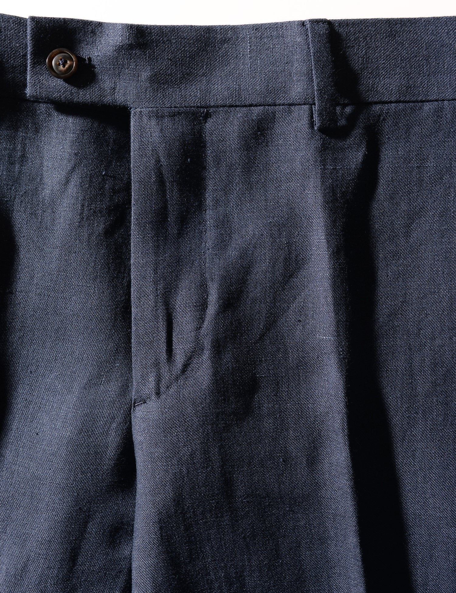 Detail shot of Brooklyn Tailors BKT50 Tailored Trousers in Linen Twill - Salerno Blue showing front button closure