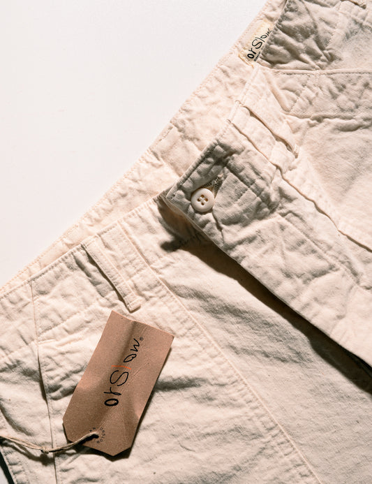 Close-up of button, waistband, and tag of Orslow Original Napped Twill Summer Fatigue Pants - Ecru