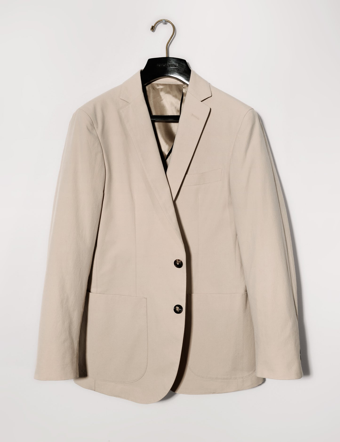 Brooklyn Tailors BKT35 Unstructured Jacket in Crisp Cotton Blend - Desert Sand full length shot on hanger