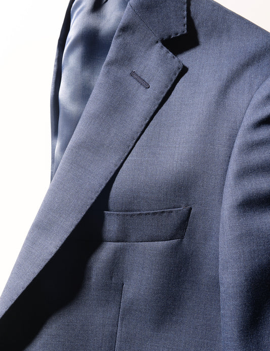 Detail shot of Brooklyn Tailors BKT50 Tailored Jacket in Rustic Tropical Wool - Montana Blue showing lapel and chest pocket