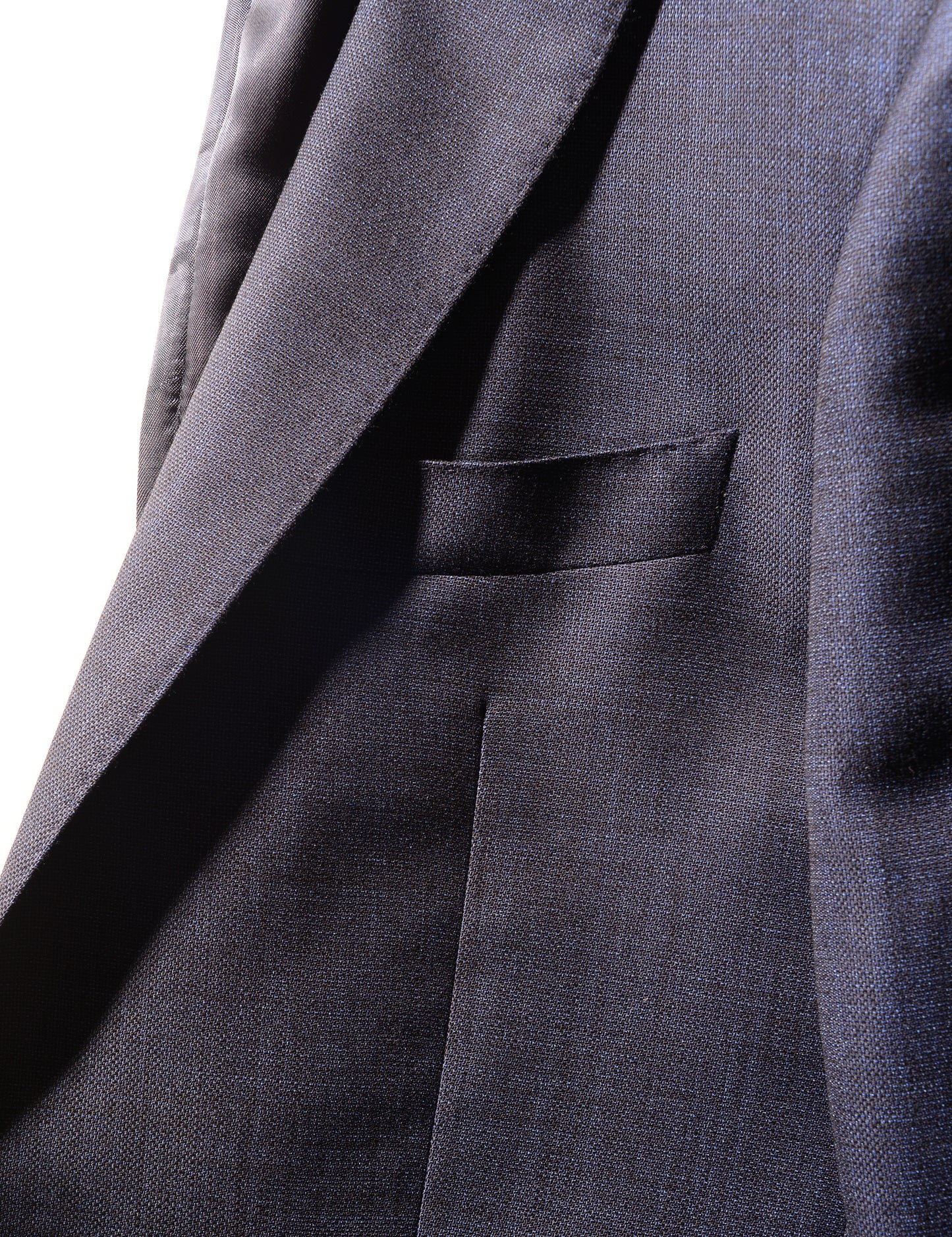 Detail shot of Brooklyn Tailors BKT50 Tailored Jacket in Textured Wool - Deep Sea showing lapel and chest pocket