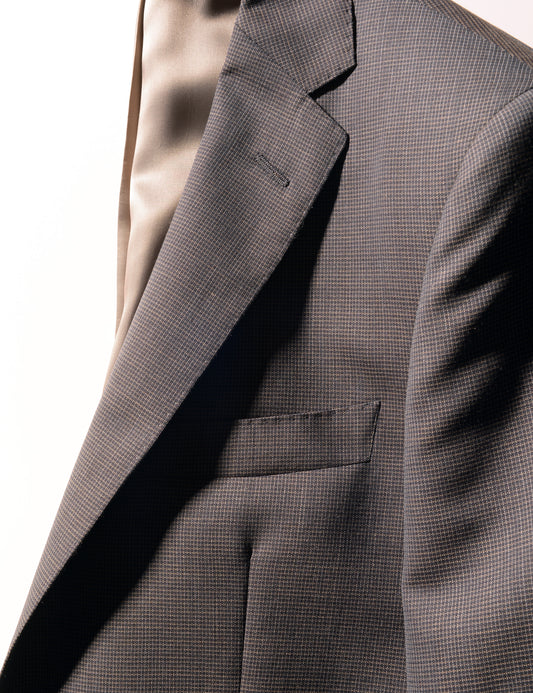 Detail shot of Brooklyn Tailors BKT50 Tailored Jacket in Wool Grid Weave - Iron Oxide showing lapel and chest pocket