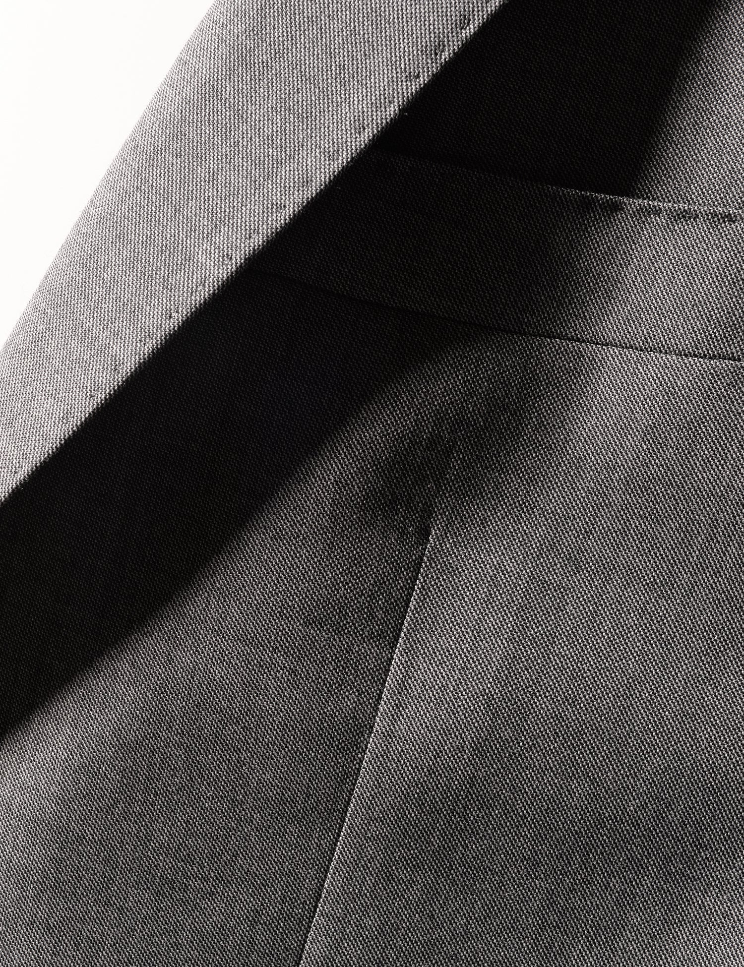 Detail shot of Brooklyn Tailors BKT50 Tailored Jacket in Wool Sharkskin - Salt and Pepper Gray showing lapel and fabric texture
