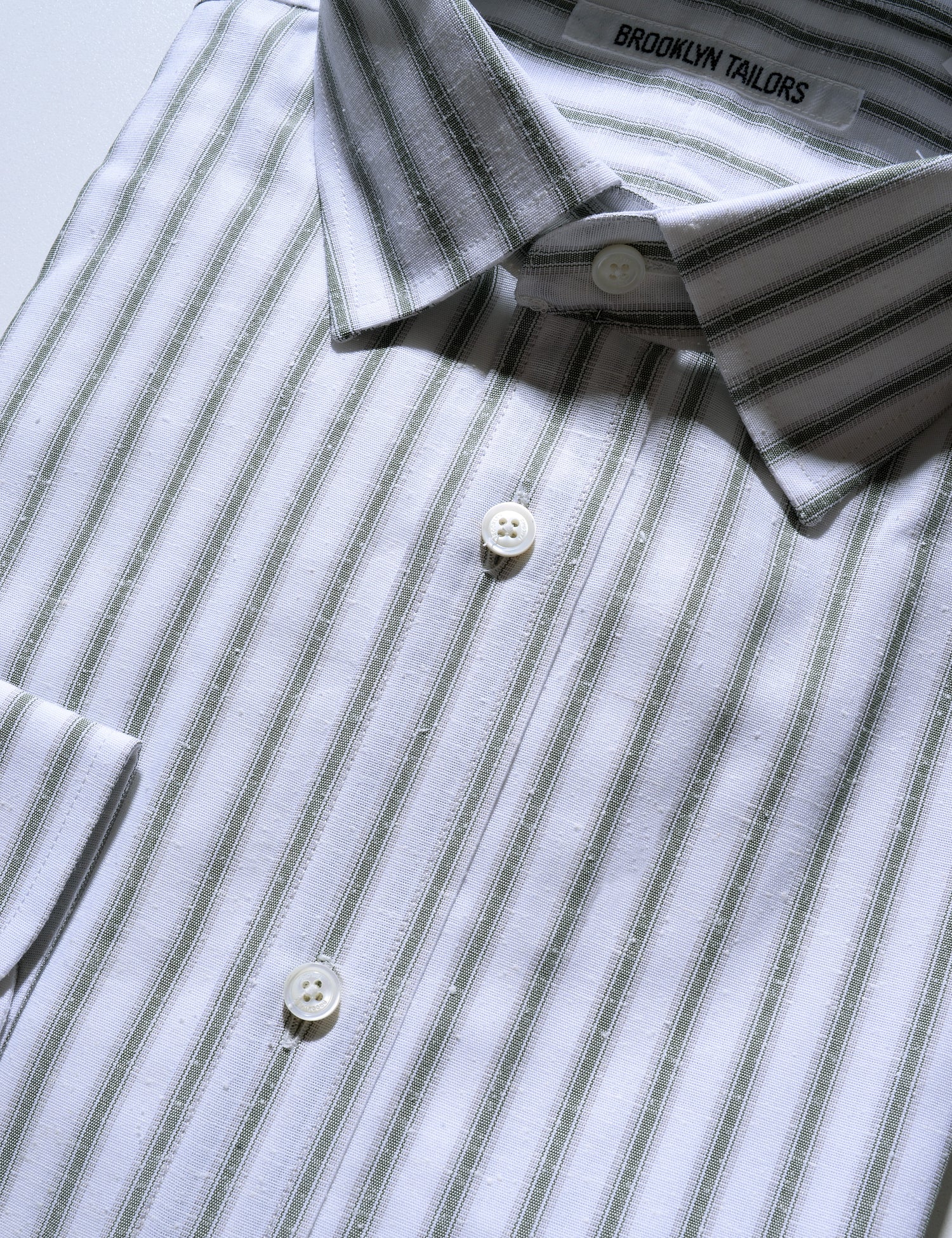 Detail of BKT20 Slim Dress Shirt in Striped Cotton / Silk - Saguaro showing collar and label