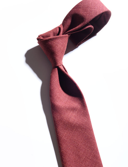 Detail of Wool Silk/Linen Tropical Tie in Sienna Red showing fabric texture