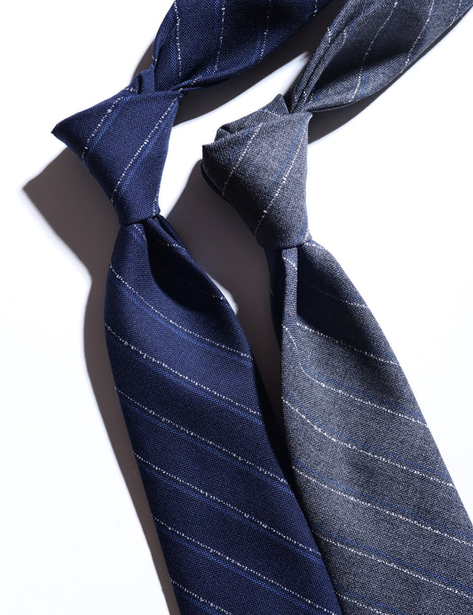 Detail of Untipped Mid-gray with Gray and White Chalkstripe Tie showing fabric pattern and texture