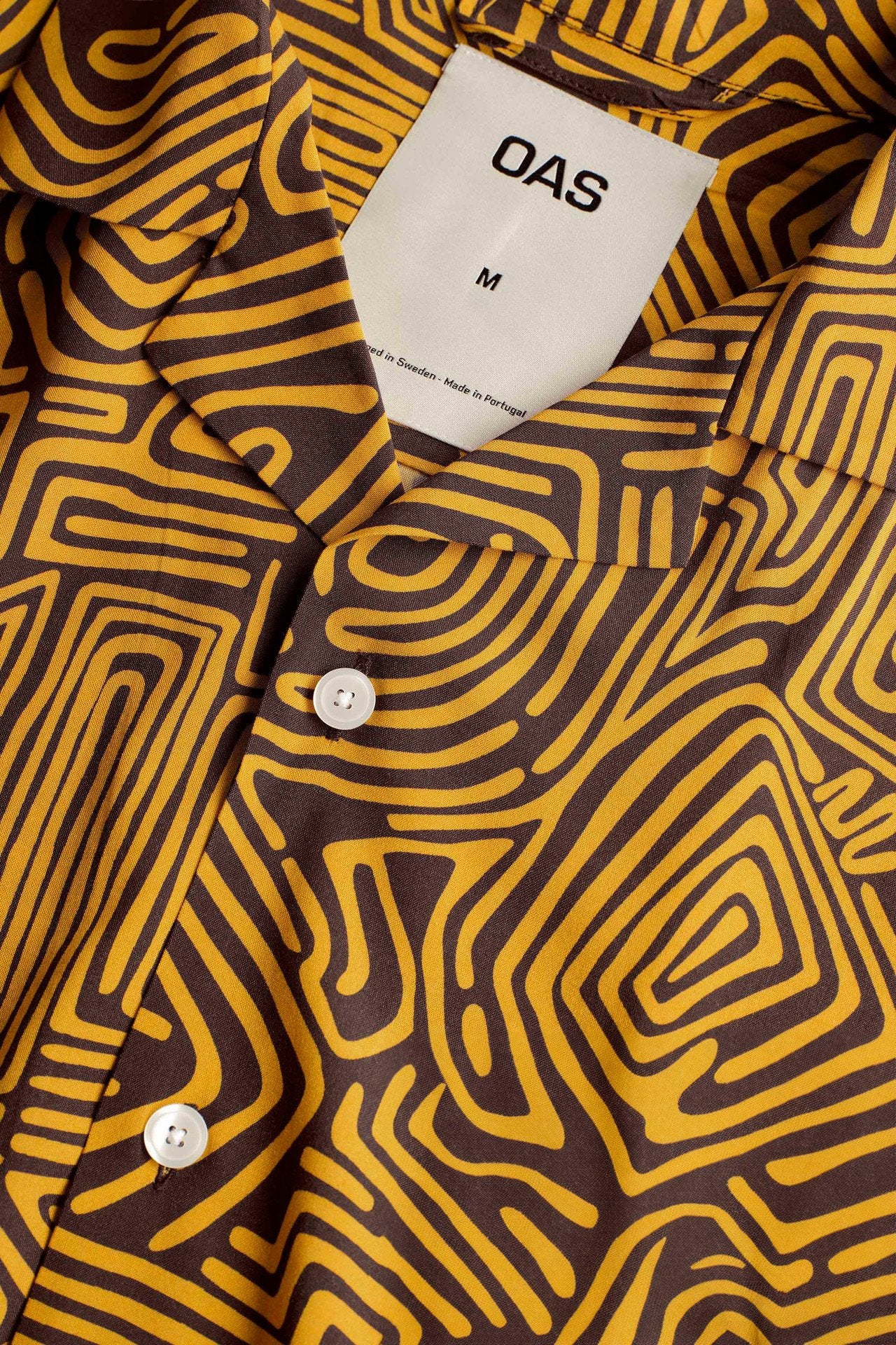 Detail of OAS Tawny Golconda Viscose Shirt showing camp collar and pattern