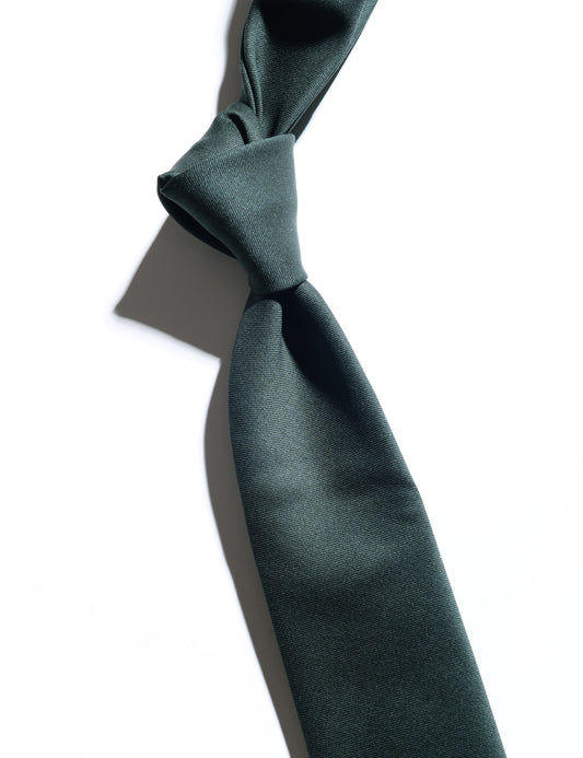Detail of Wool Twill Tie - Winter Green showing fabric texture