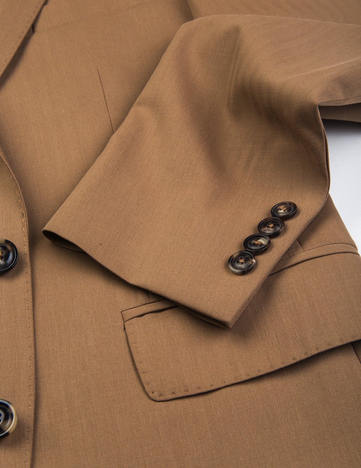 Detail of BKT50 Tailored Blazer in Herringbone Wool/Cotton - Tobacco showing cuff and hip pocket