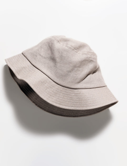 Flat shot of Cableami French Linen Bucket Hat - Ecru