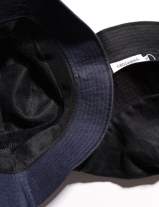 Photo of interior of two Cableami French Linen Bucket Hats