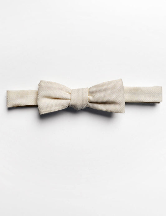 Flat shot of Brooklyn Tailors Formal Bowtie in Ivory Hopsack