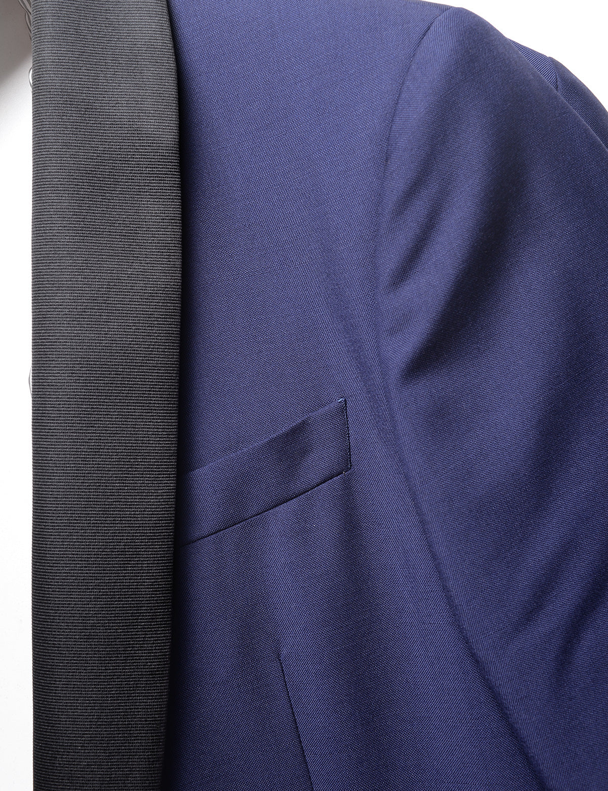 Detail shot of Brooklyn Tailors BKT50 Shawl Collar Tuxedo Jacket in Wool / Mohair - Ink Blue with Grosgrain Lapel showing grosgrain lapel, pocket, and fabric texture