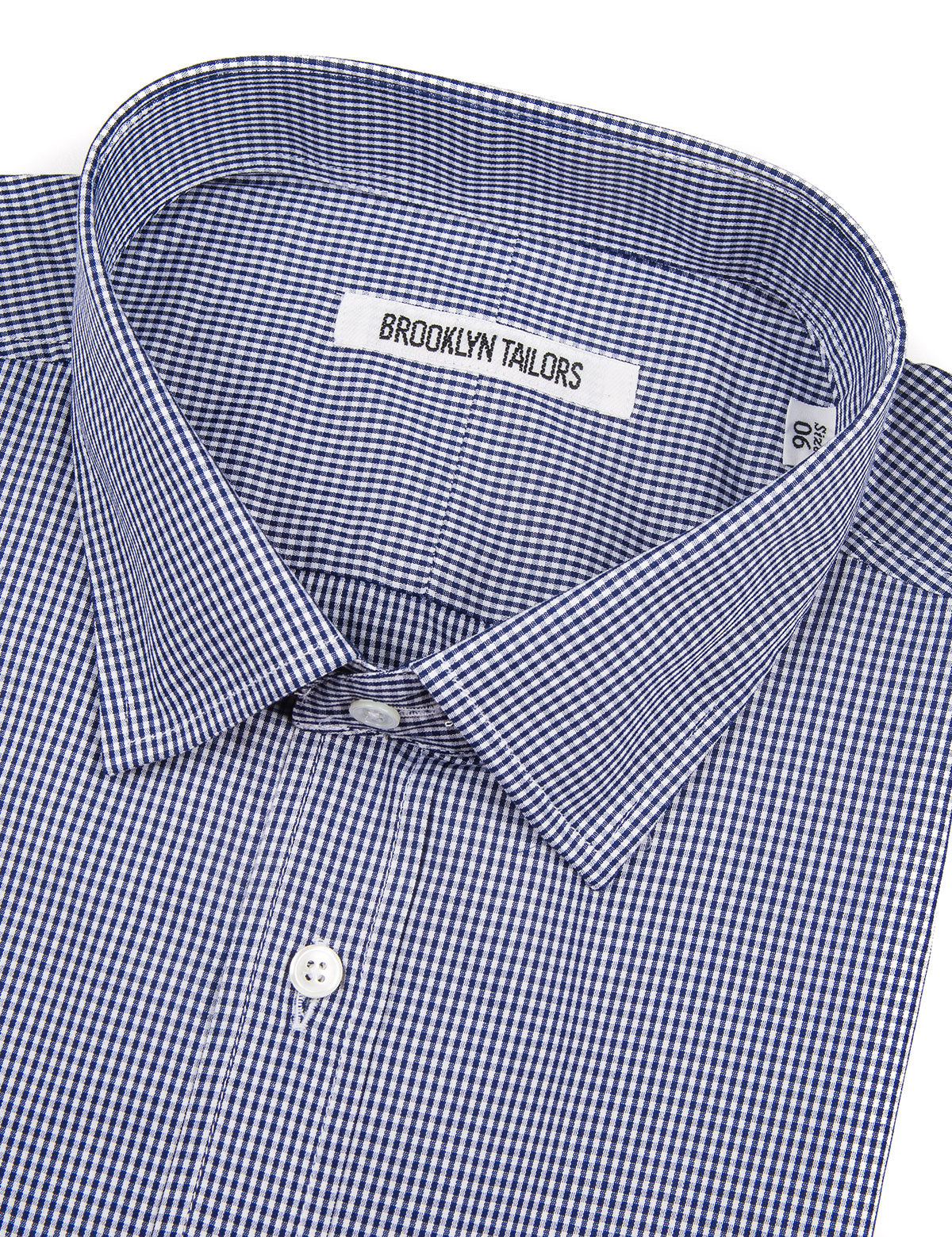 Detail of collar, fabric pattern, and buttons on Brooklyn Tailors BKT20 Slim Dress Shirt in Micro Gingham - White and Navy