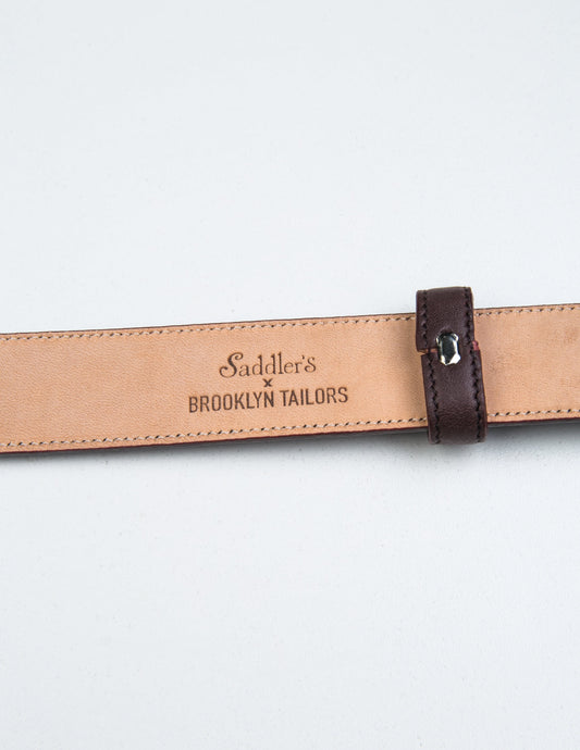 Detail of Saddler's x Brooklyn Tailors stamp on the underside of 30mm Belt in Smooth Leather - Bordo