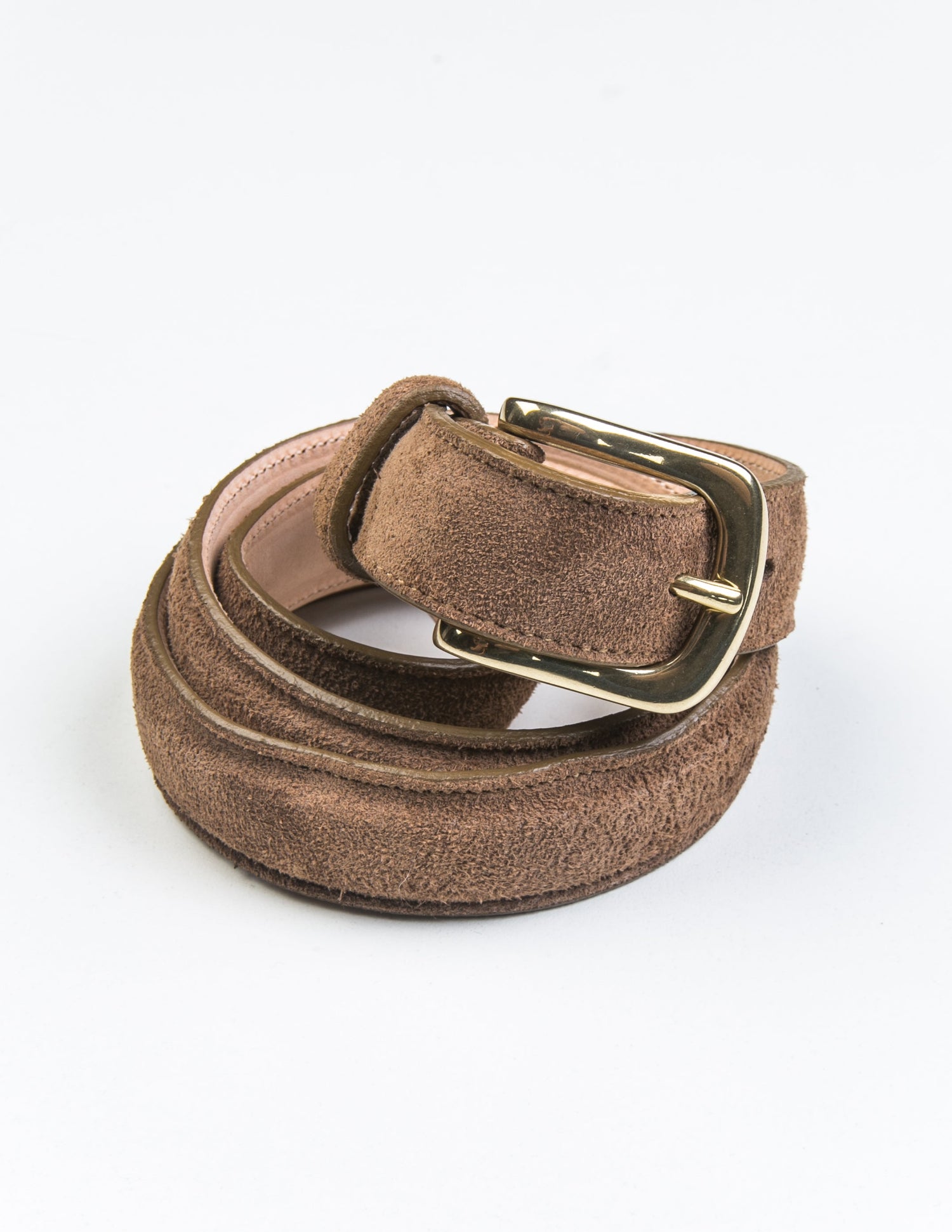 Photo of Brooklyn Tailors x Saddler's 25mm Belt in Suede Leather - Clay coiled up.