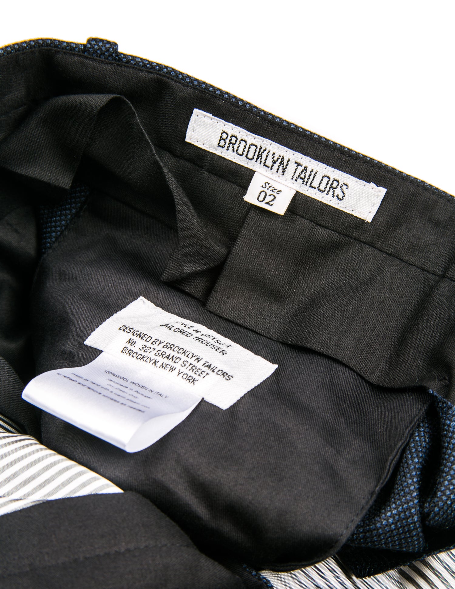 Detail of BKT50 Tailored Trouser in Birdseye Weave - Navy showing labels