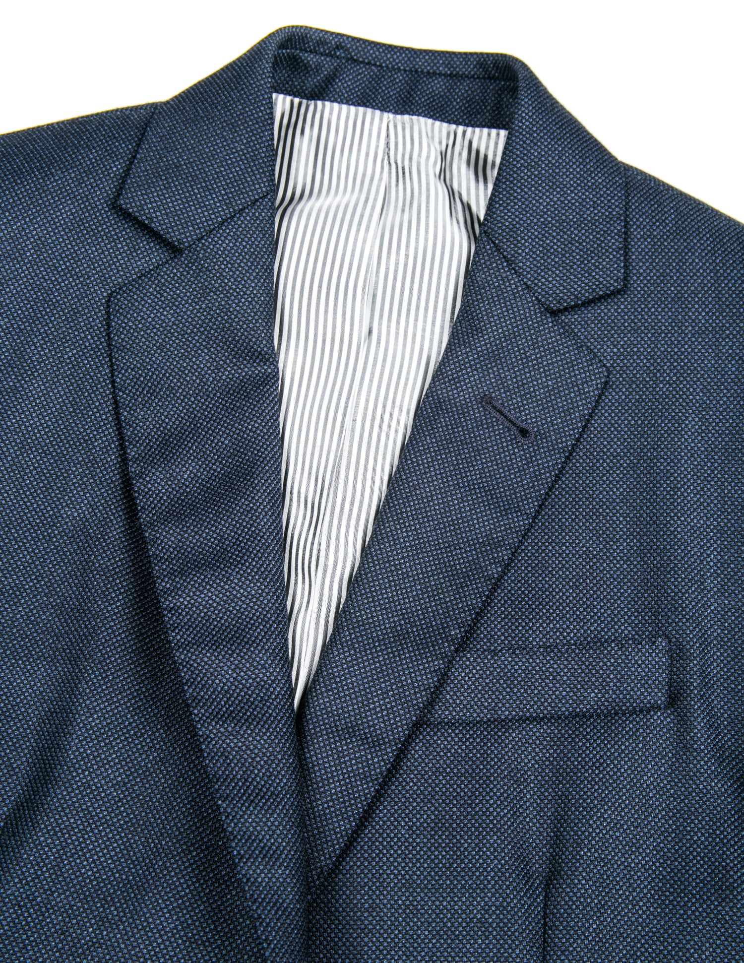 Detail of BKT50 Tailored Jacket in Birdseye Weave - Navy showing lapel , lining, and fabric texture