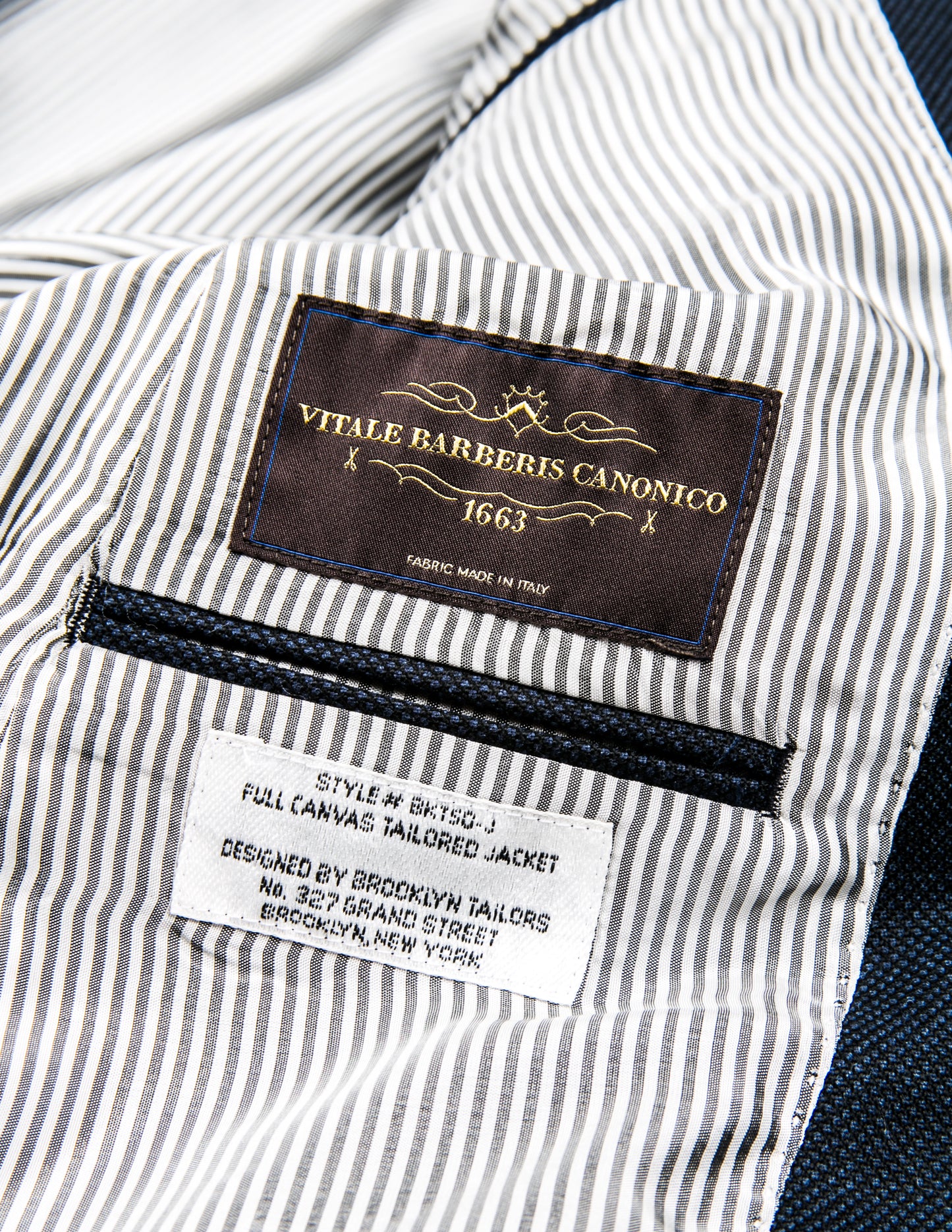 Detail of BKT50 Tailored Jacket in Birdseye Weave - Navy showing lining and labeling