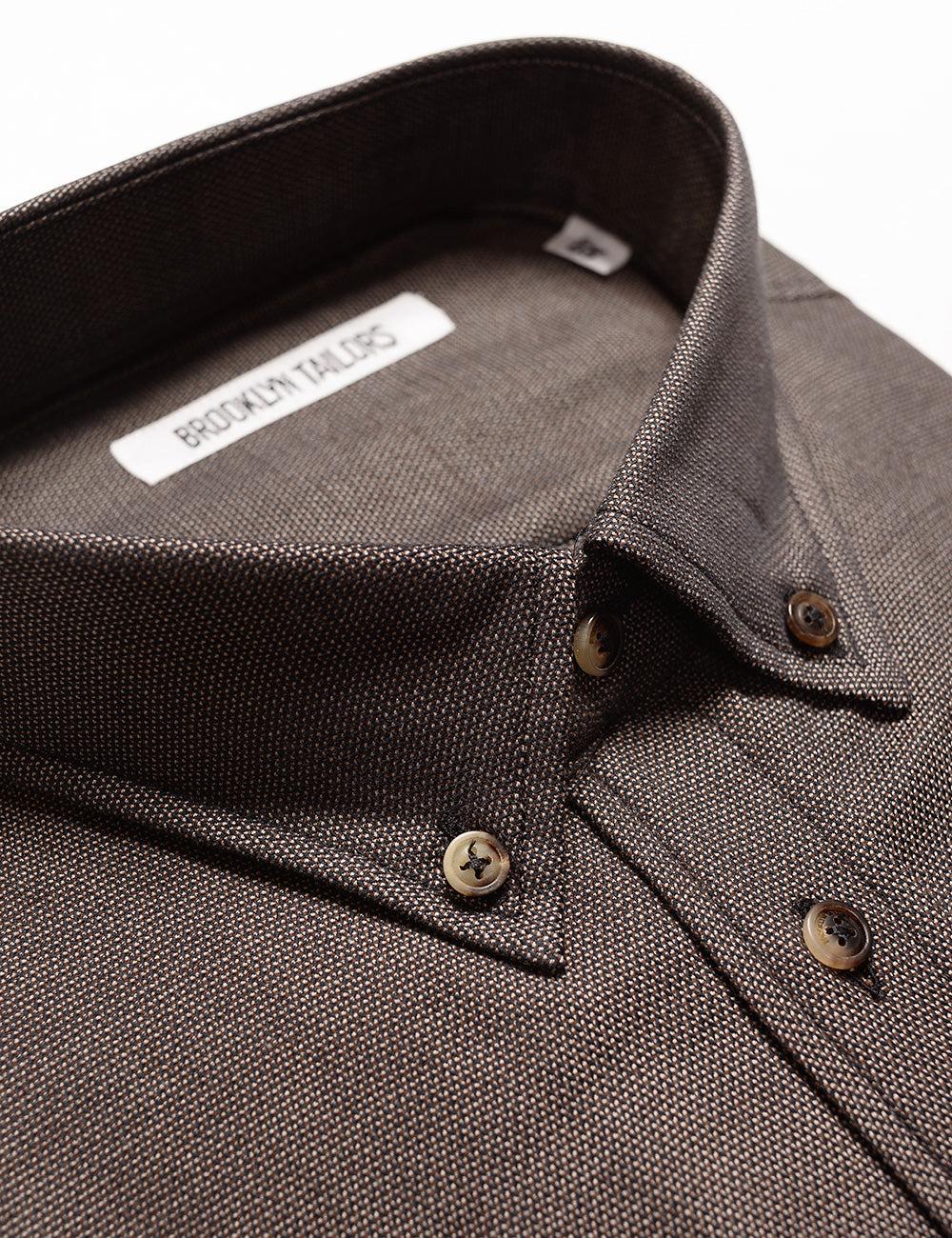 Detail of Brooklyn Tailors BKT10 Slim Casual Shirt in Soft Basketweave - Earth showing collar, buttons, and fabric texture
