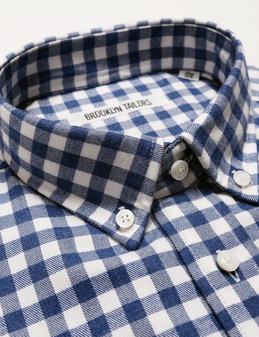 Detail of Brooklyn Tailors BKT10 Slim Casual Shirt in Brushed Cotton Gingham - Blue and White showing collar and fabric texture