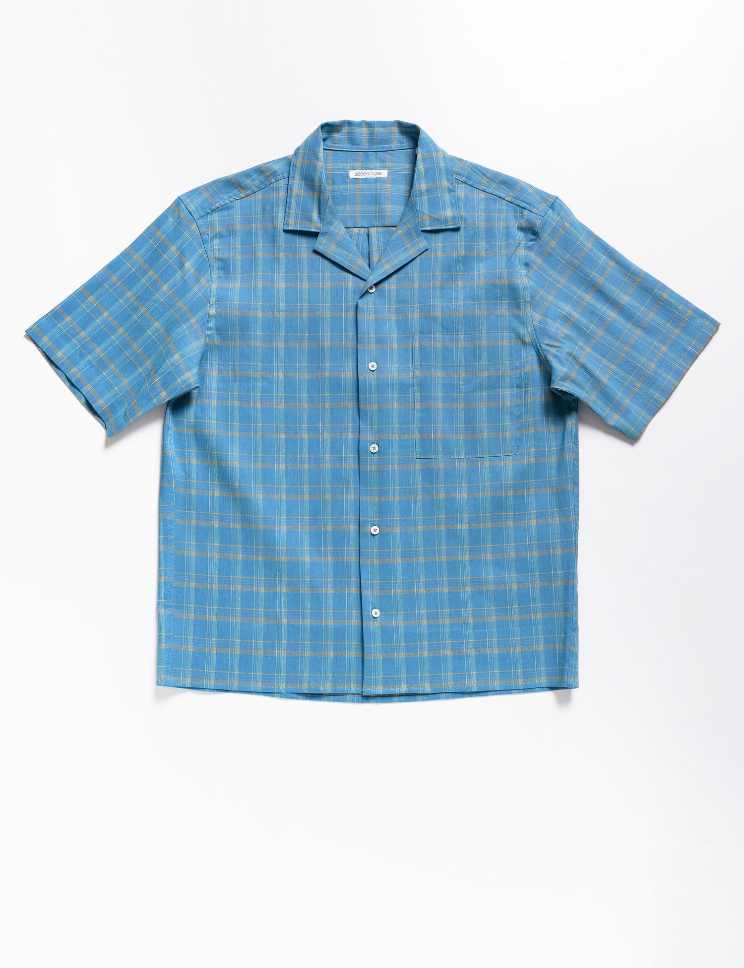Full length flat shot of Brooklyn Tailors BKT18 Camp Shirt in Roman Check - Ionian Blue
