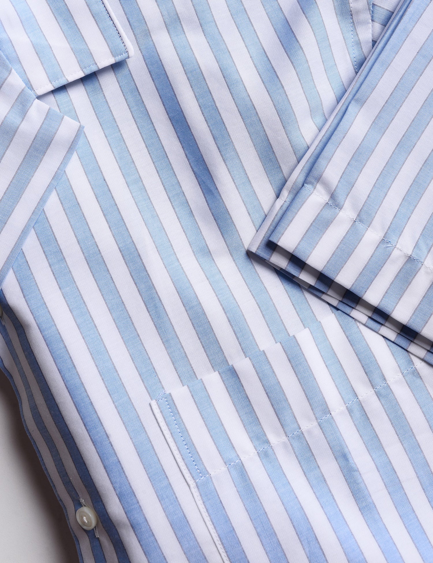 Detail of BKT18 Camp Shirt in Bar Stripe - Air Blue showing sleeve and fabric pattern