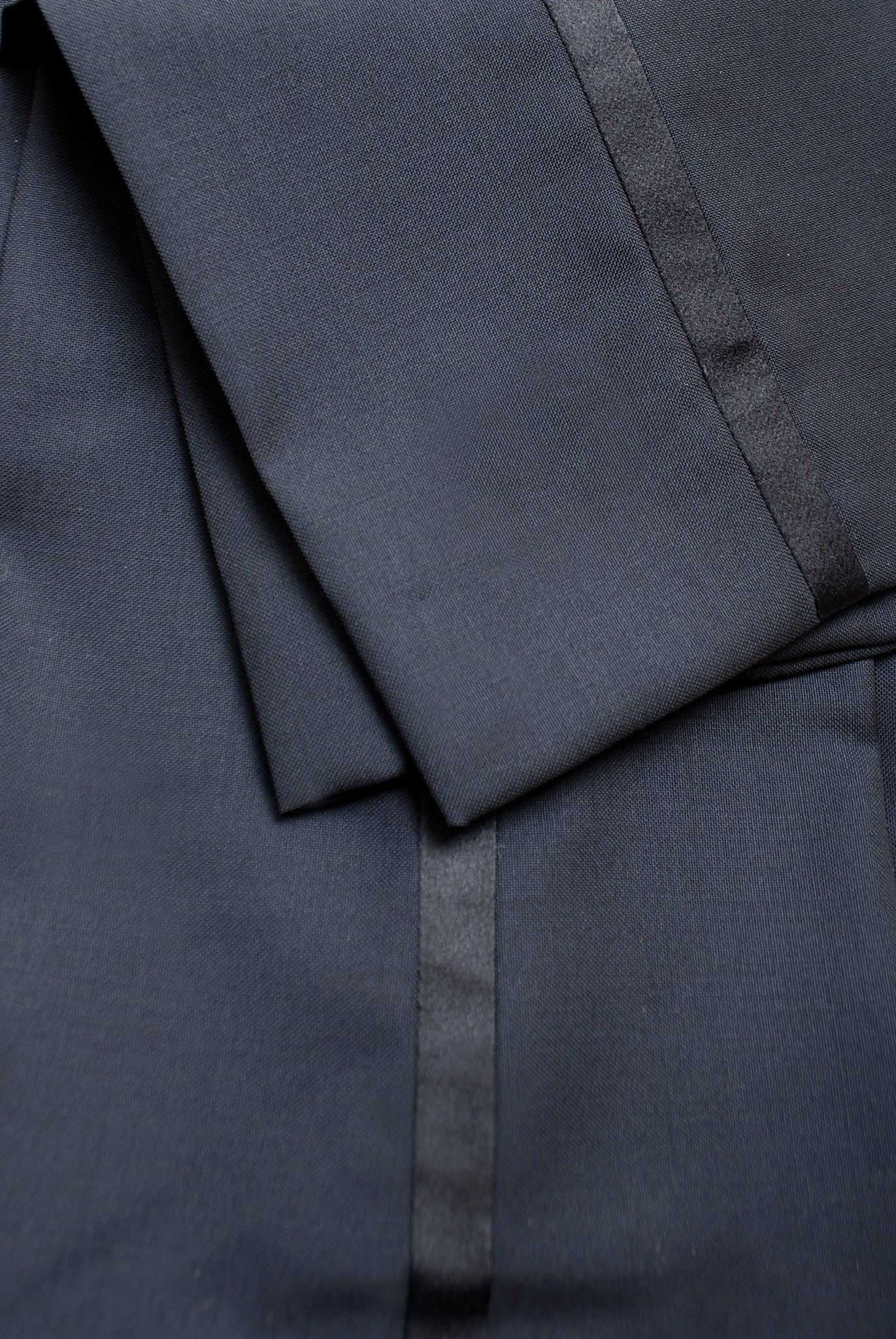 Close up of Brooklyn Tailors BKT50 Tuxedo Trouser in Super 110s - Black with Satin Stripe showing satin stripe and fabric texture