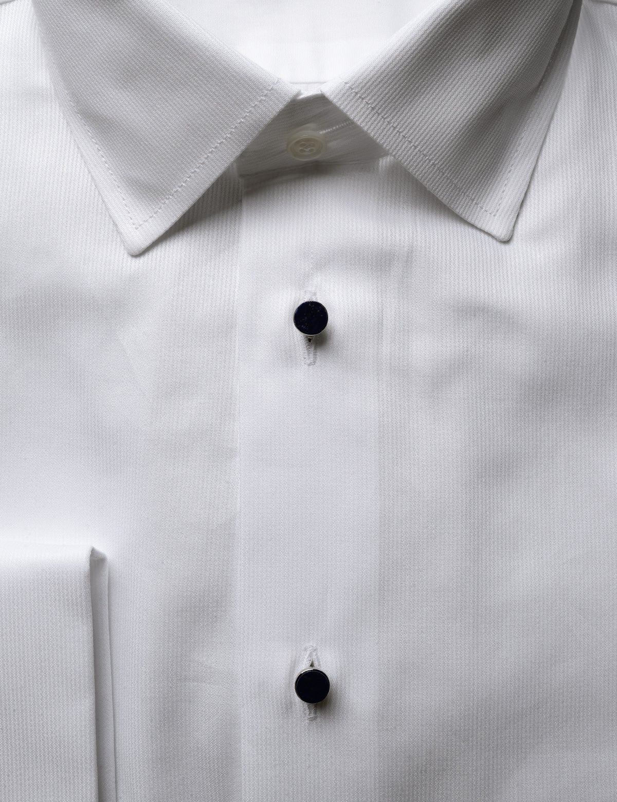 Detail of placket using shirt studs instead of removable button strip