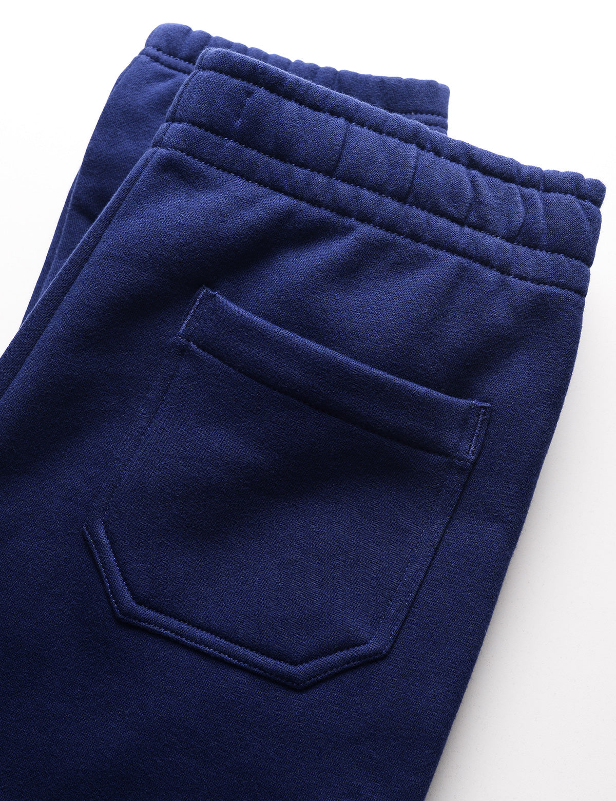 Detail of the waistband and back pocket of Calvin Klein Archive Logo Fleece Jogger - Beacon Blue