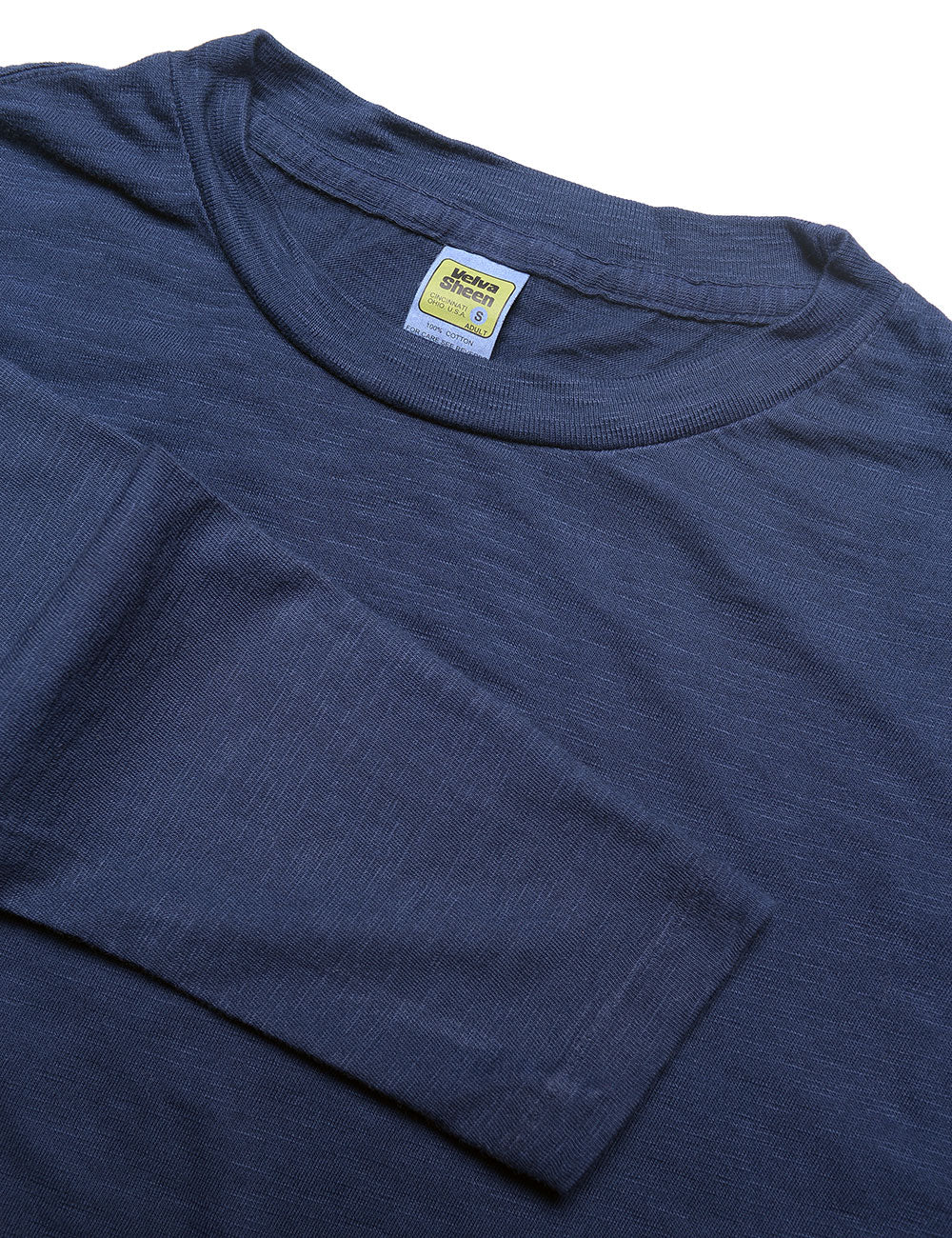 Detail of Velva Sheen Long Sleeve Crewneck T-Shirt in Navy showing collar, sleeve and fabric texture