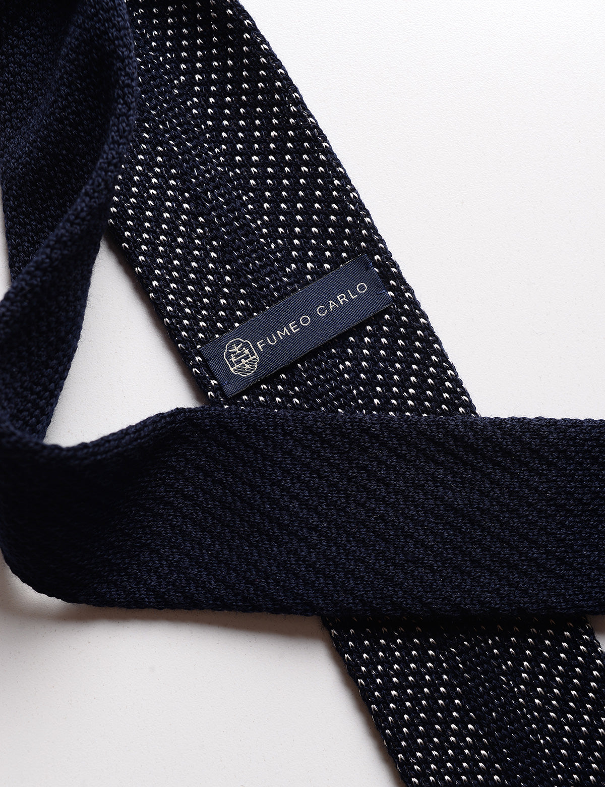 Detail of label and knit of Pincushion Silk & Wool Knit Tie - Night Sky