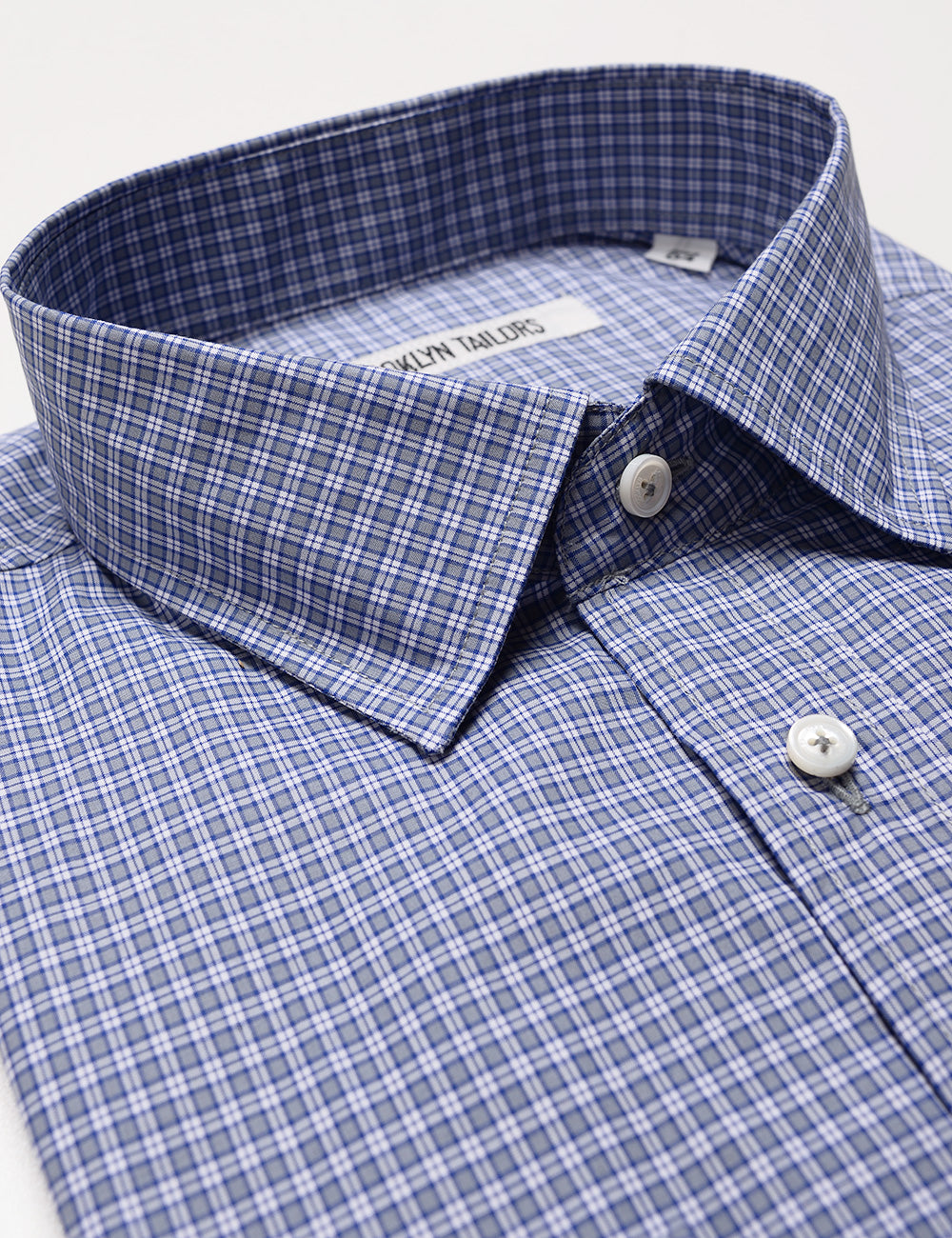 Detail of collar, buttons, and fabric pattern of Brooklyn Tailors BKT20 Slim Dress Shirt in Mini Plaid - Blue and Gray