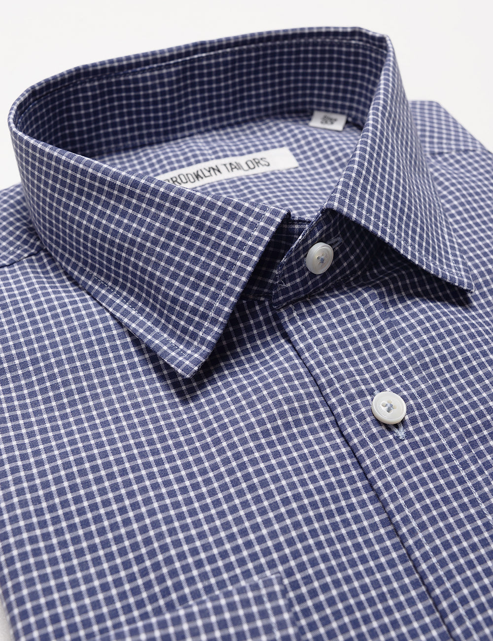 Detail of Brooklyn Tailors BKT20 Slim Dress Shirt in Grid Check - Heather Blue & White showing collar and labeling
