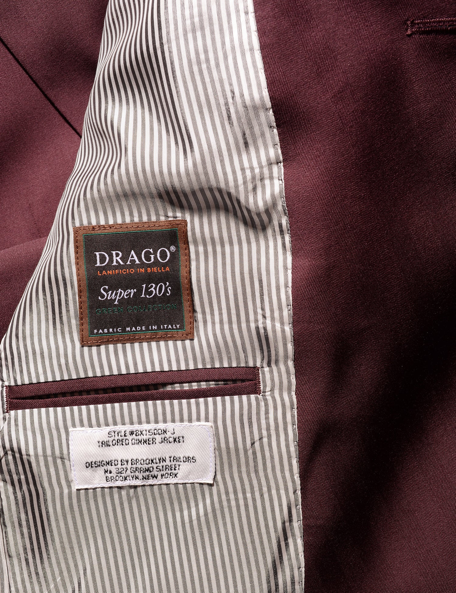 Detail shot of Brooklyn Tailors BKT50 Shawl Collar Dinner Jacket in Wool Herringbone - Syrah showing Drago label on interior body