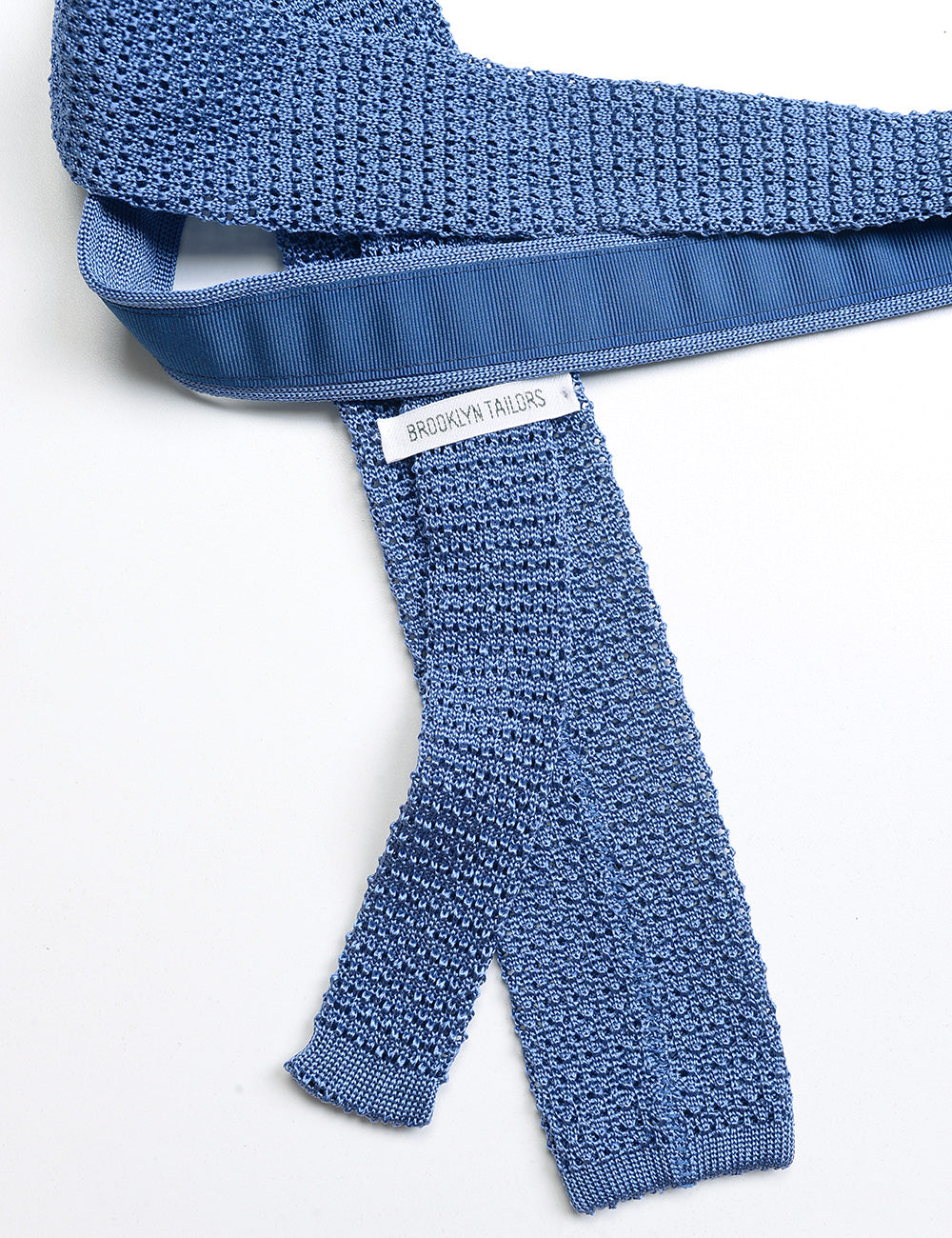 Back detail of Italian Silk Knit Tie - Blue Poppy