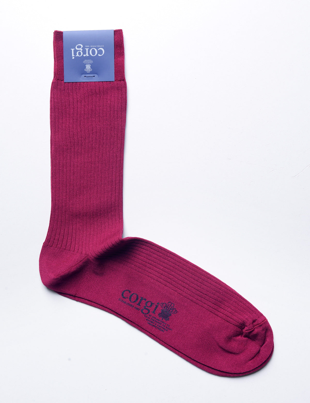 Flat shot of Corgi Ribbed Dress Socks in Mercerized Cotton - Berry