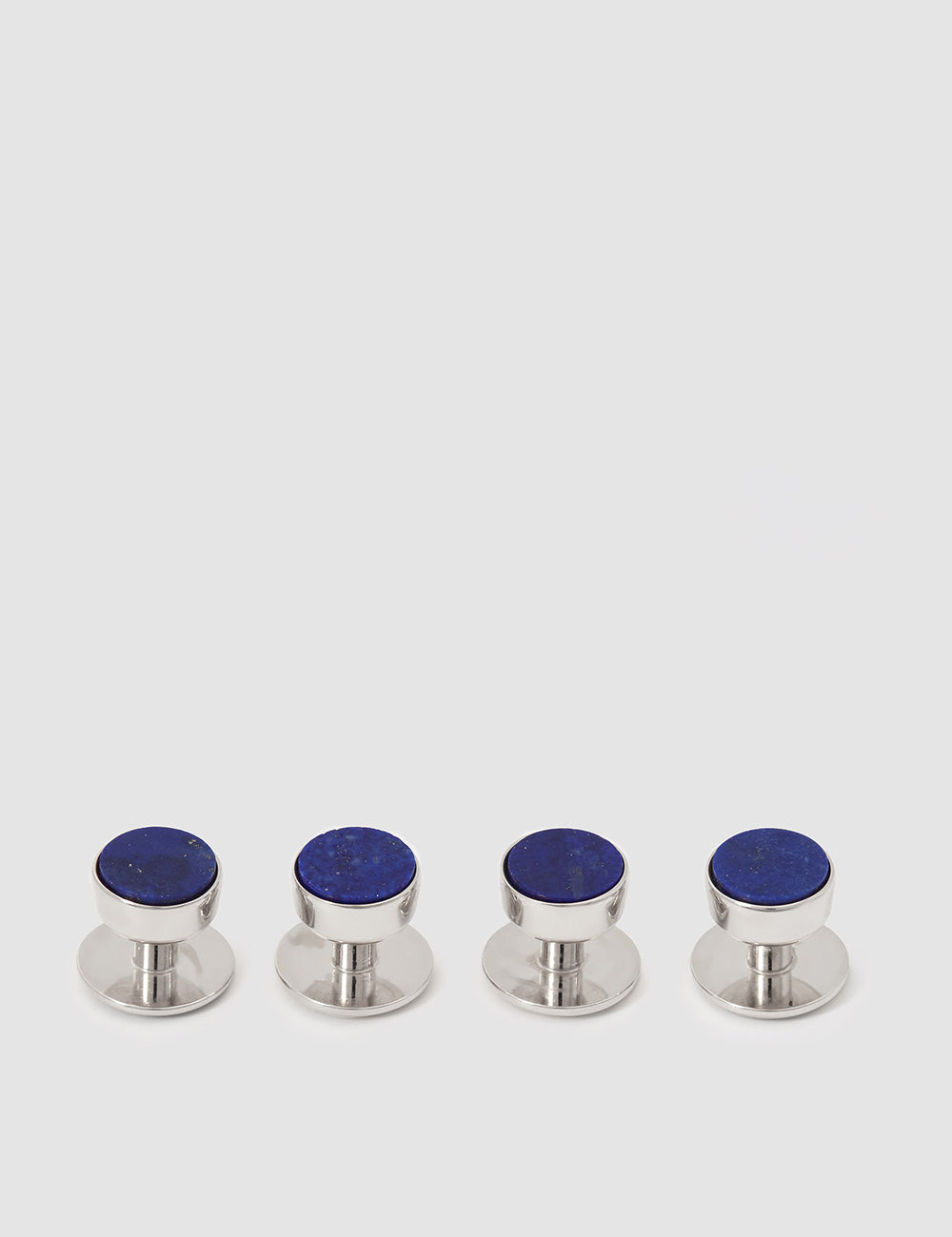 Flat shot of Codis Maya Stone Bow Stud Set in White Rhodium & Lapis Lazuli