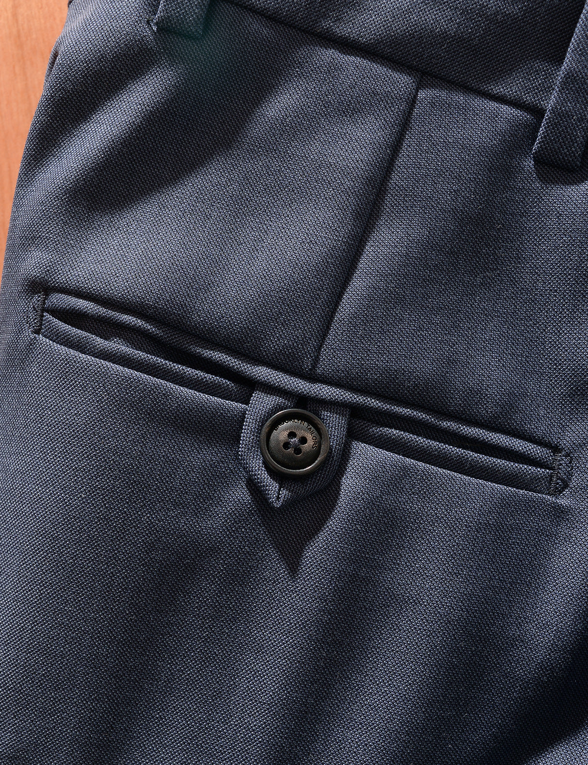 Close up of BKT50 Tailored Trousers in Wool Sharkskin - Haze Blue  showing back pocket