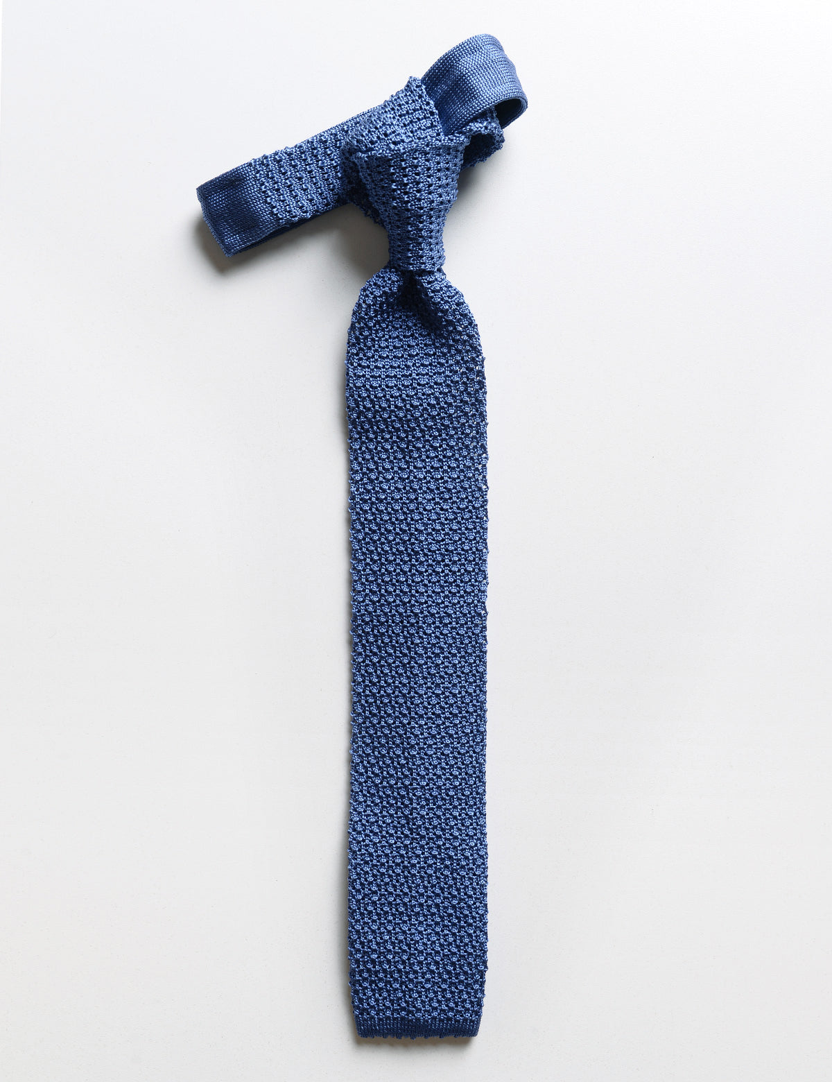 Flat shot of Brooklyn Tailors Italian Silk Knit Tie - Blue Poppy