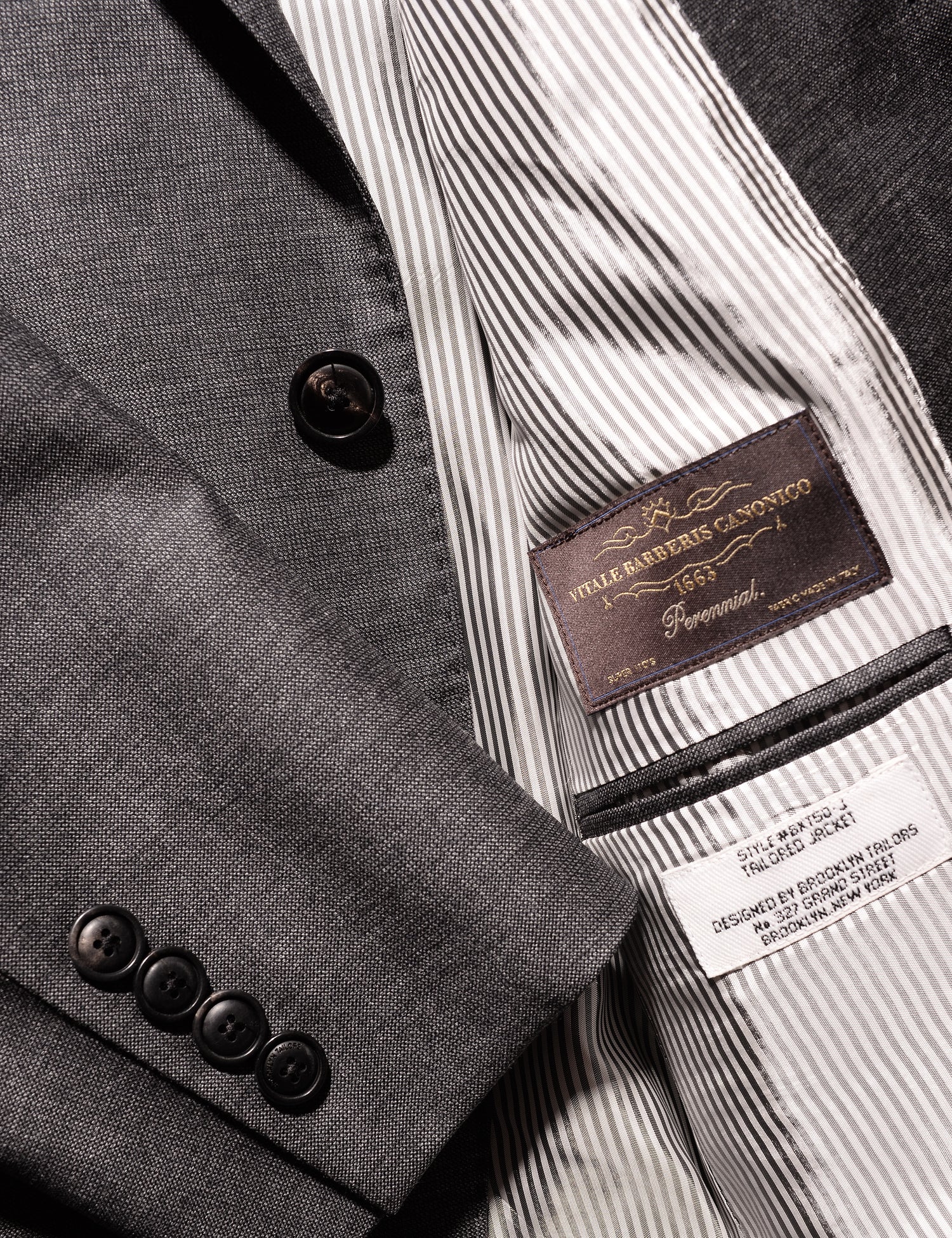 Detail shot of Brooklyn Tailors BKT50 Tailored Jacket in Wool Tickweave - Deep Gray showing cuff, lining, and interior labels