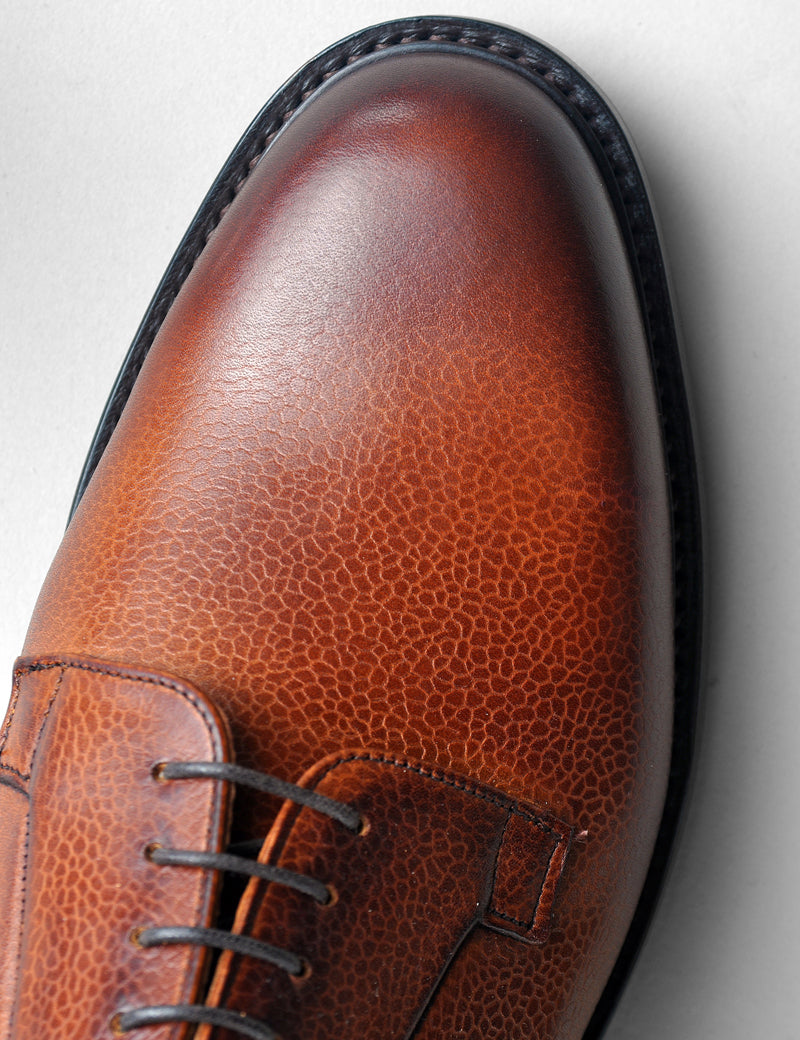 Close-up of Joseph Cheaney Deal II Derby in Mahogany Grain Leather showing leather grain, toe, and laces