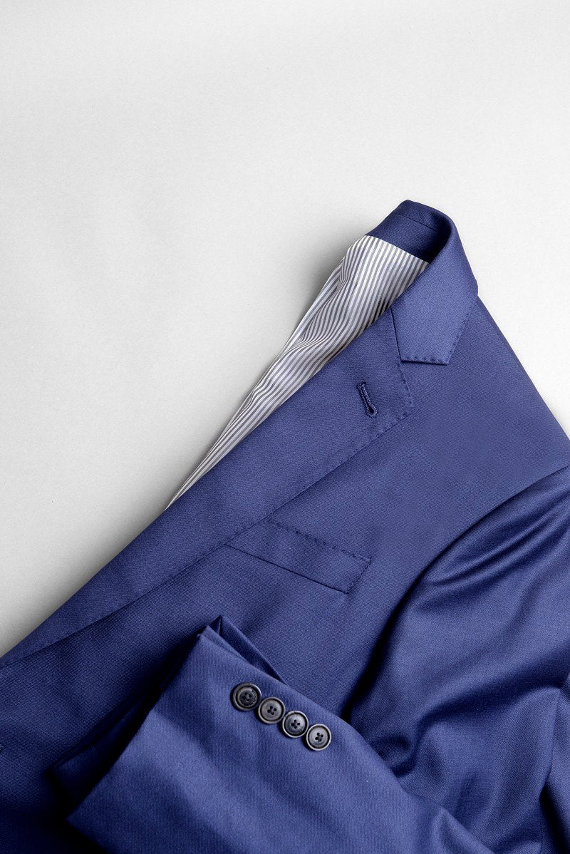 Detail of Brooklyn Tailors 2020 Version BKT50 Tailored Jacket in Super 120s Twill - Bright Navy showing lapel, chest pocket, and sleeve